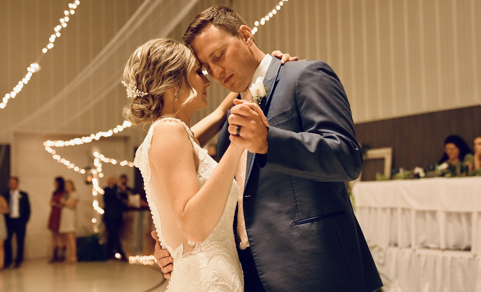 Bride and groom sharing their first dance